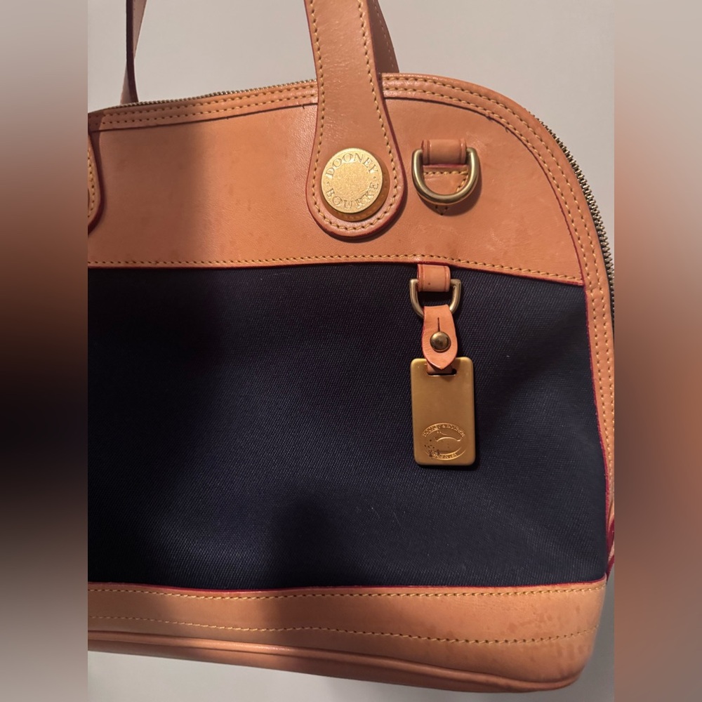 Dooney & Bourke Tan and Navy small purse hand bag